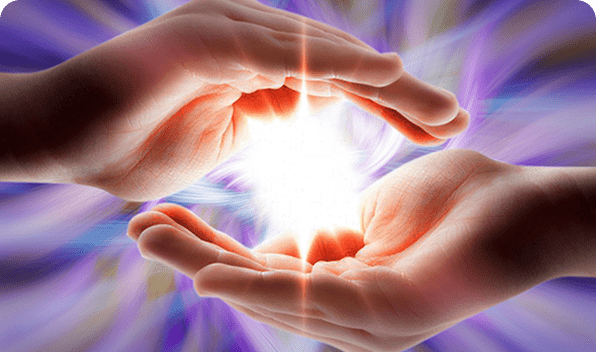 Two hands holding a bright glowing light.